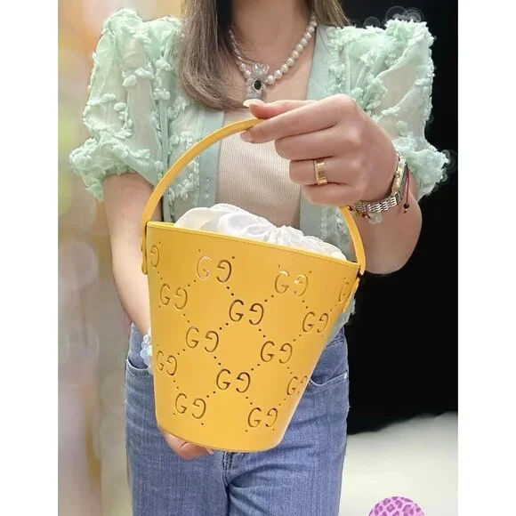 Gucci Kids GG Supreme Perforated Bucket Bag Yellow 723051